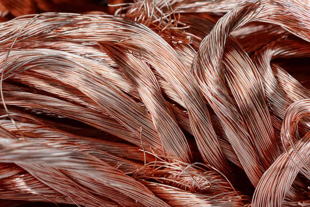A pile of oxygen-free copper wire scrap ready for recycling.