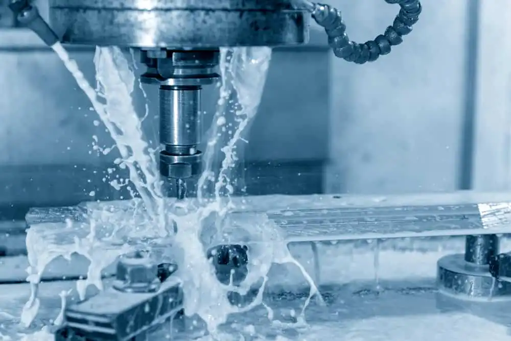 CNC machining with coolant fluid