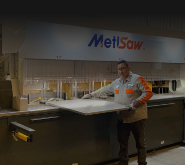 Metal Expert Holding Aluminum Plate in Metal Factory